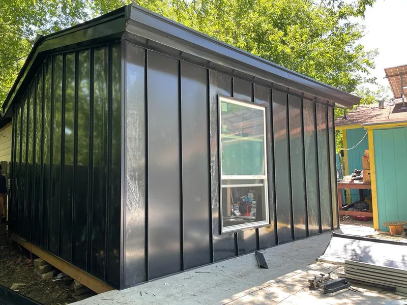 Black standing seam metal wall panels for Metal Roof Installation in Providence