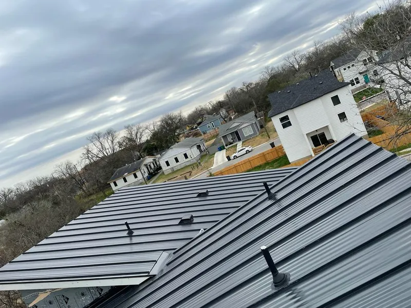 Standing seam metal roof panels with vents for Skylight Repair in Providence